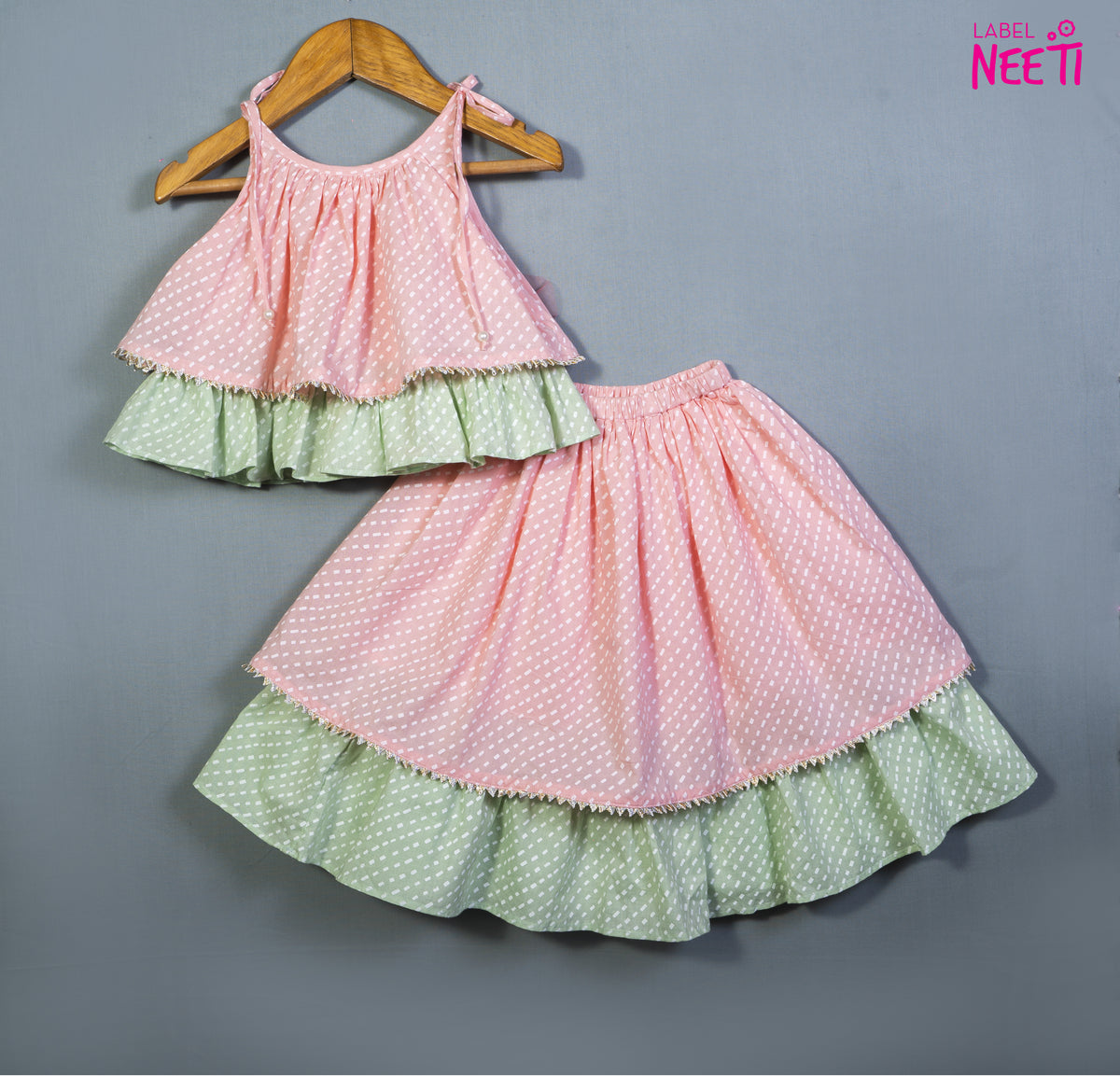 Printed Tie Up Strap Top And Lehenga in Pastel Colors