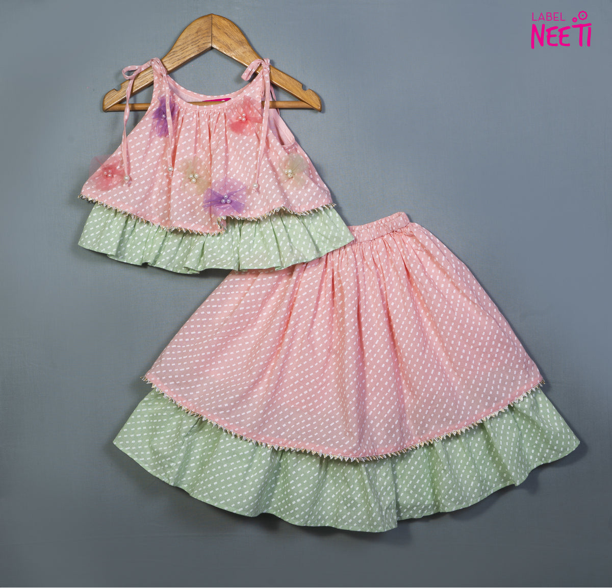 Printed Tie Up Strap Top And Lehenga in Pastel Colors