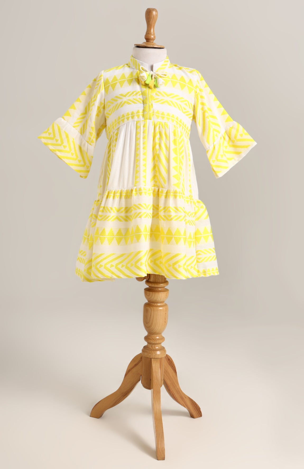Cotton Dress with Bell Sleeves. Detailed with Dori and Tassels