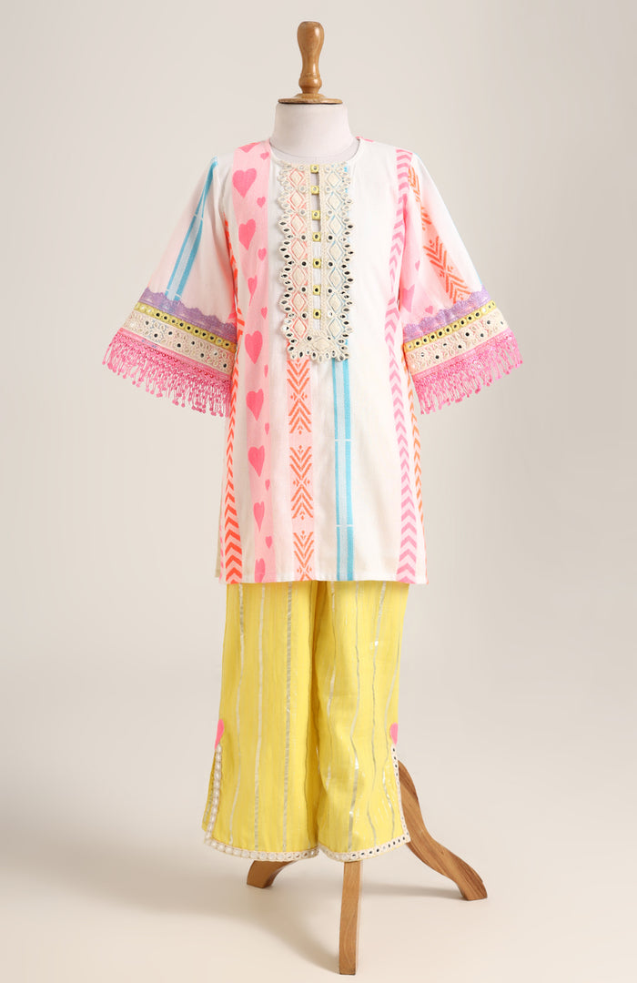 Handloom Cotton Kurta paired with Silver Lurex Pants. Detailed with mirror lace.