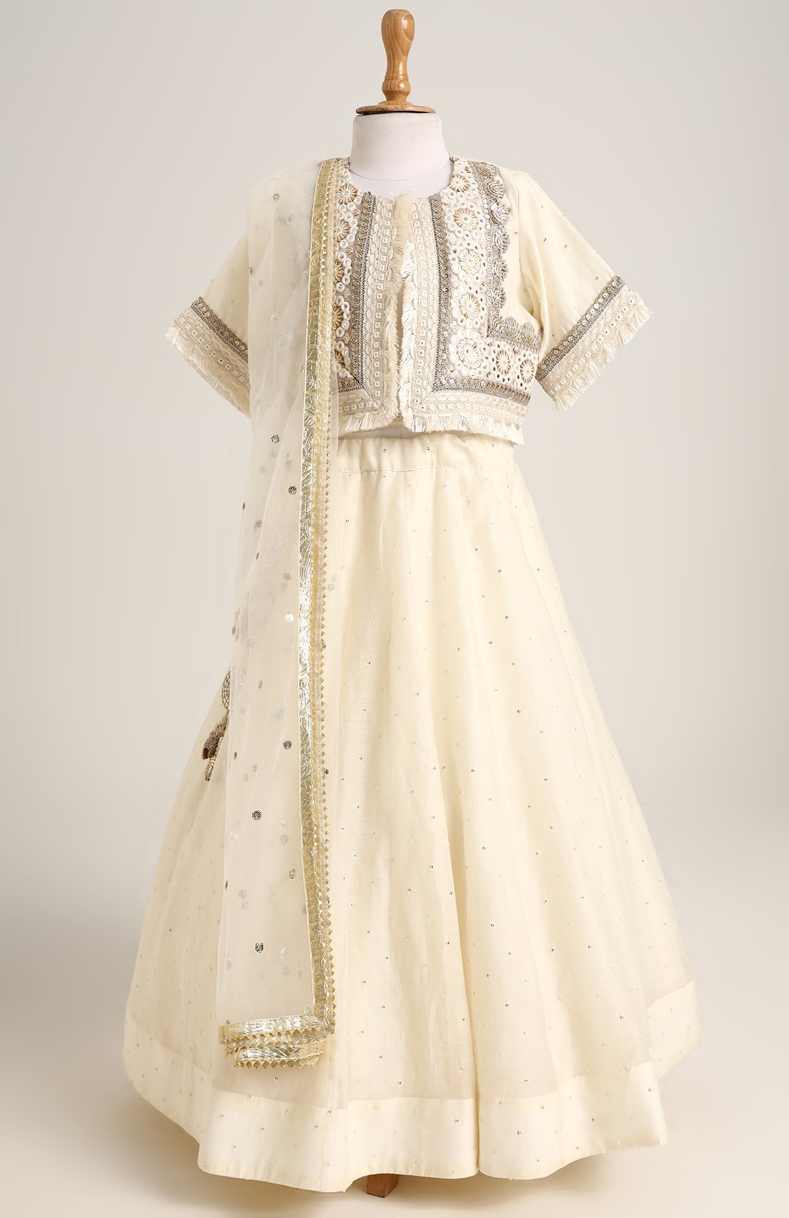 Chanderi Jacket style choli paired with a chanderi lehnga with sequin emb and Soft Net Dupatta.