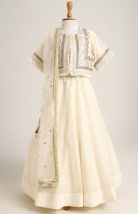 Chanderi Jacket style choli paired with a chanderi lehnga with sequin emb and Soft Net Dupatta.