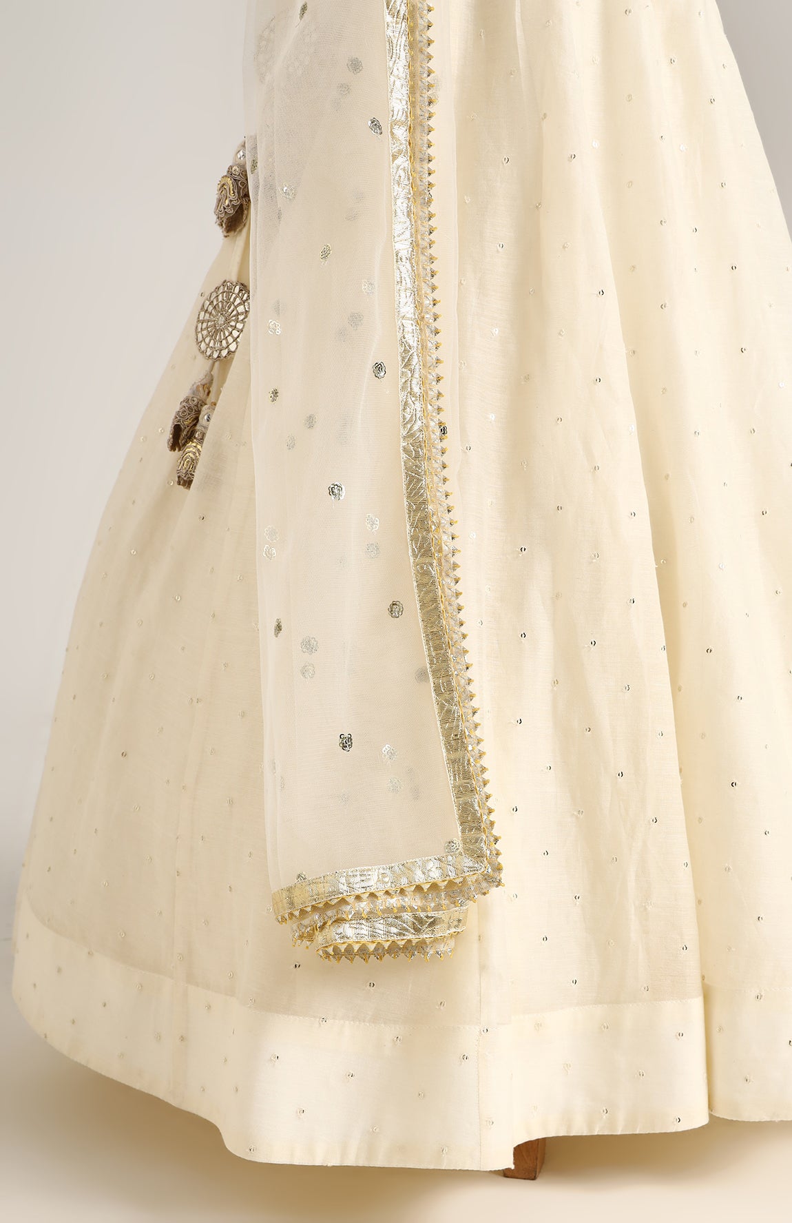 Chanderi Jacket style choli paired with a chanderi lehnga with sequin emb and Soft Net Dupatta.