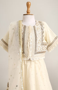 Chanderi Jacket style choli paired with a chanderi lehnga with sequin emb and Soft Net Dupatta.