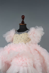 Embellised layered pink dress with detachable trail and bow with swirled bowie hairband