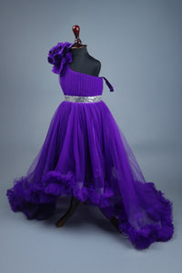 blue one shoulder high low dress with matching head band and detachable bow