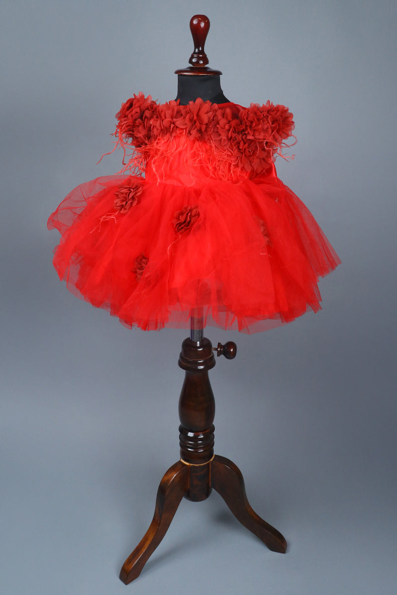 red flower dress with feathers and headband with detachable bow