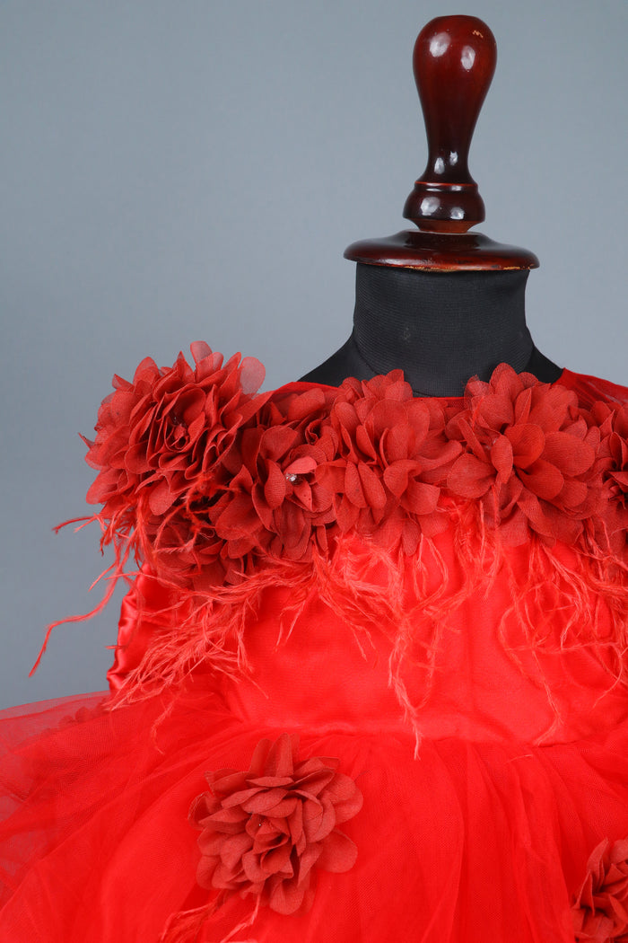 red flower dress with feathers and headband with detachable bow