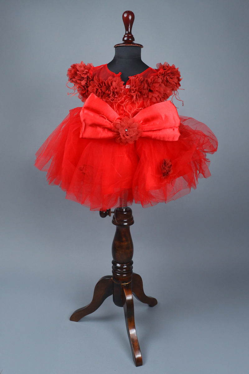 red flower dress with feathers and headband with detachable bow
