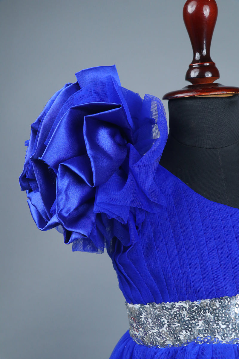 Blue one shoulder high low dress with matching head band and detachable bow
