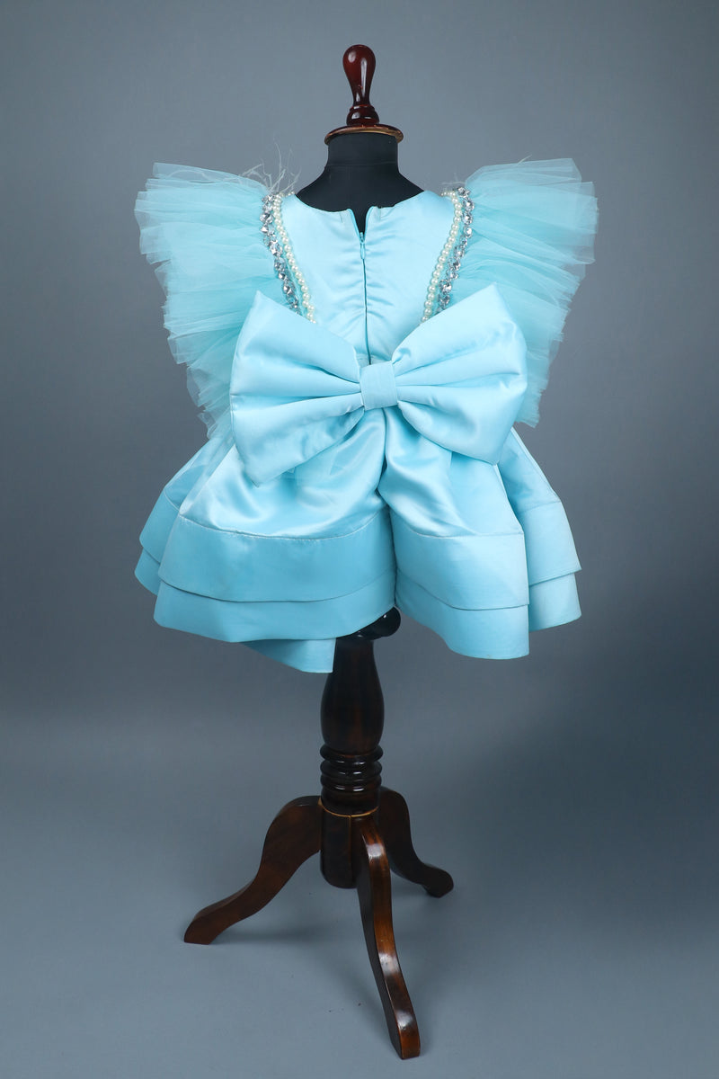 sky blue dress with purles work in chloi and feathers with head band and detachable bow