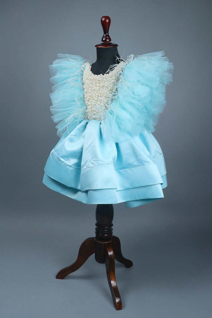 sky blue dress with purles work in chloi and feathers with head band and detachable bow