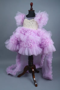 Embellised layered lilac dress with detachable trail and bow with swirled bowie hairband