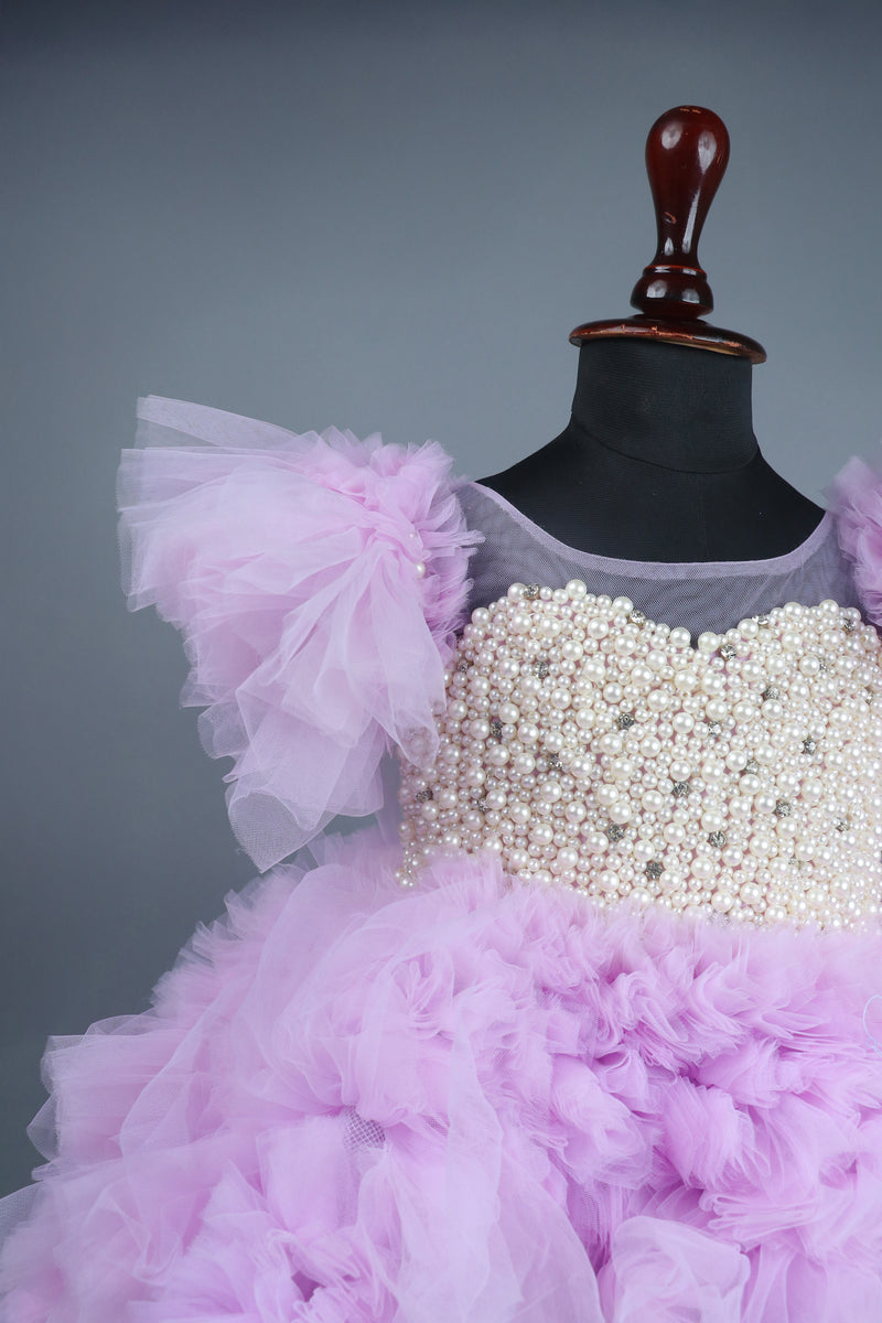 Embellised layered lilac dress with detachable trail and bow with swirled bowie hairband