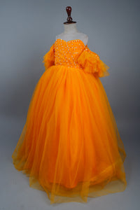 yellow full length gown with head band and detachable bow