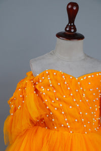 yellow full length gown with head band and detachable bow
