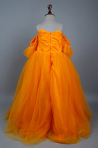 yellow full length gown with head band and detachable bow