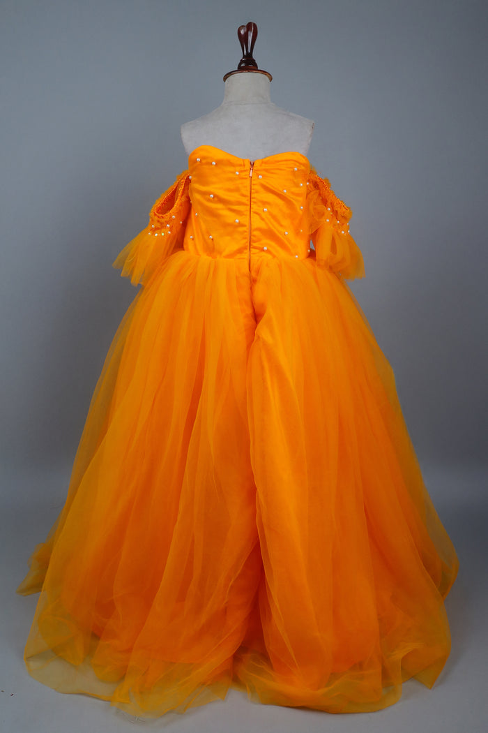 yellow full length gown with head band and detachable bow