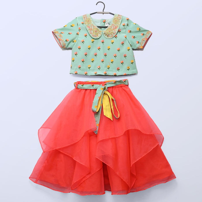 Aqua Green Printed Blouse With Pan Embroidered Collar And Asymmetrical Peach Ghaghra And Printed Belt