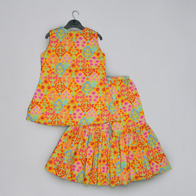 MUSTARD FLORAL PRINTED MIRROW WORK AND EMBROIDERED TOP WITH FLORAL PRINTED SHARARA SET