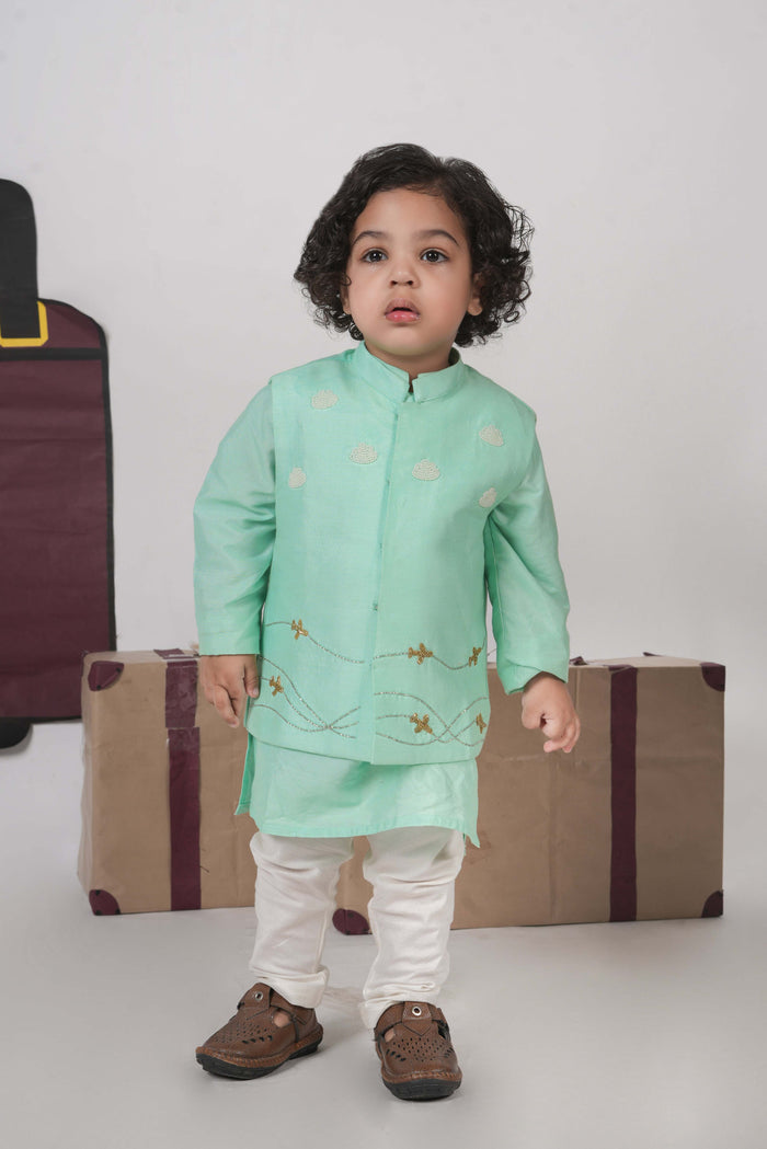 MINT GREEN KURTA WITH AEROPLANES/CLOUDS HAND EMBROIDERED BUNDI JACKET WITH PAJAMA SET