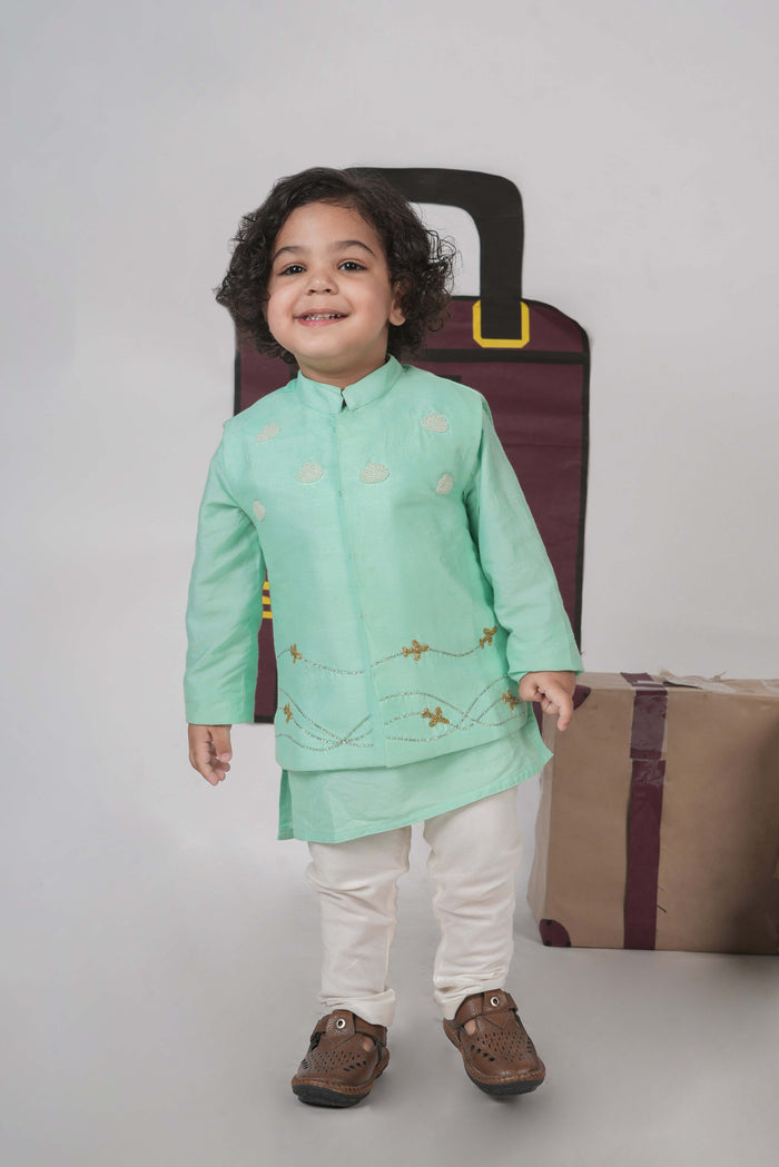 MINT GREEN KURTA WITH AEROPLANES/CLOUDS HAND EMBROIDERED BUNDI JACKET WITH PAJAMA SET