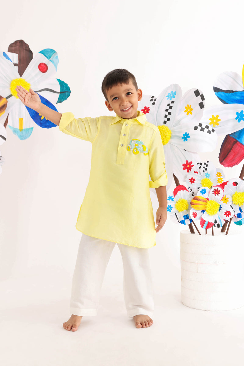 Yellow Kurta With Car Embroidered Motif And White Pyjama