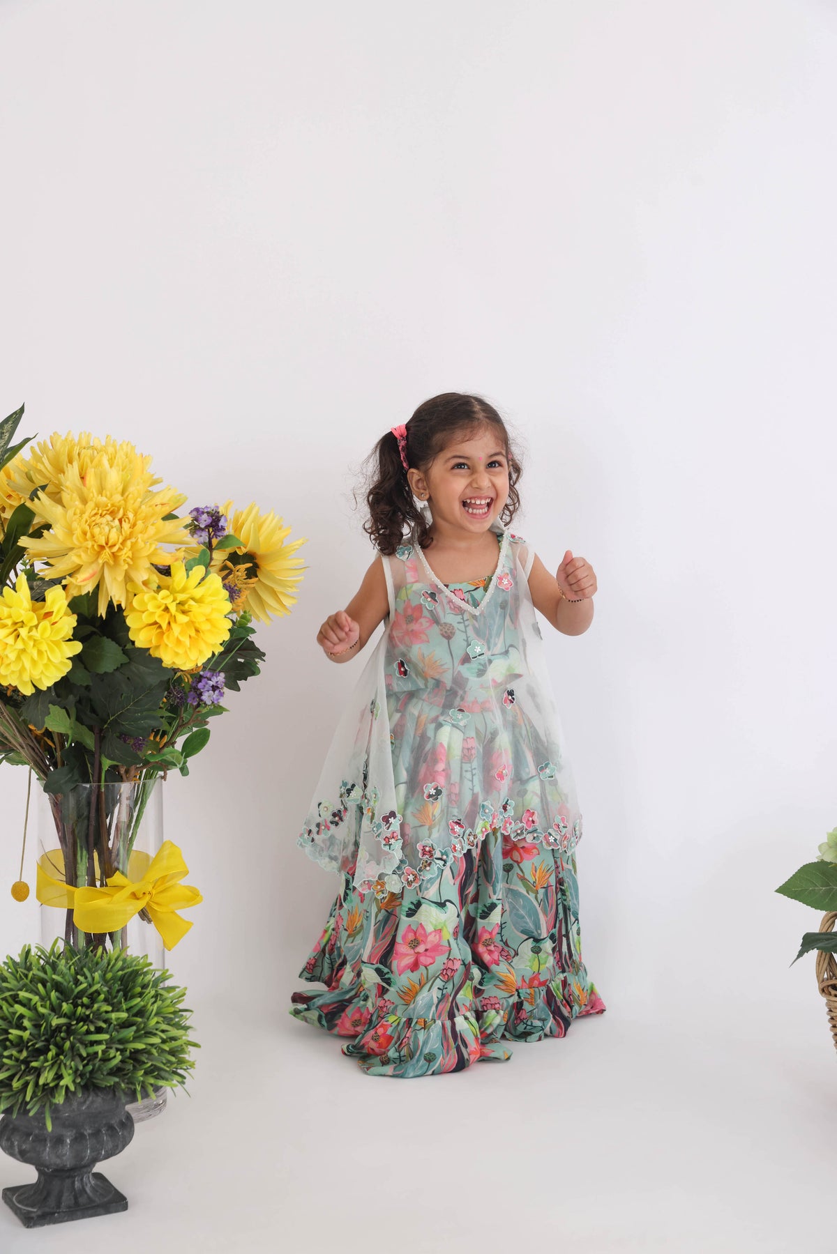 Blue Organza Cape With Cutwork Flowers And Pearls With Printed Muslin Lehenga And Top