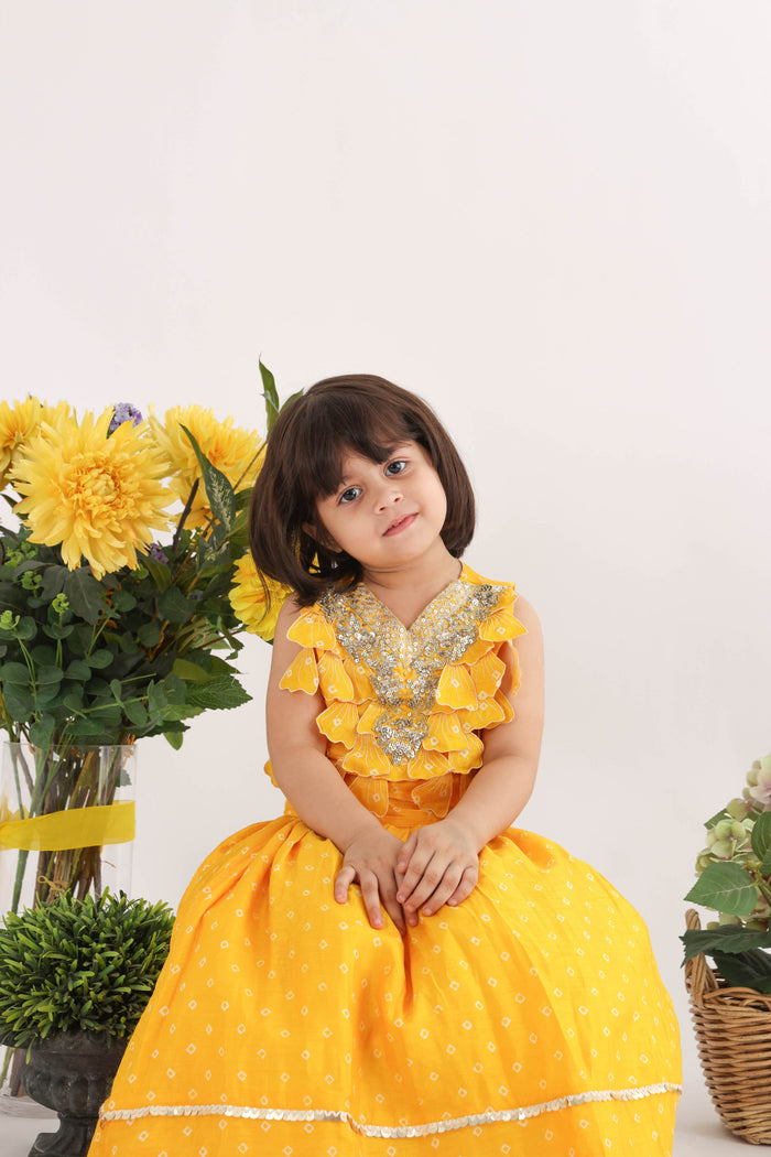 Heavy Embroidered Top With Stunning 3D Cutwork Petals And Lehenga In Yellow Printed Silk Bandhani