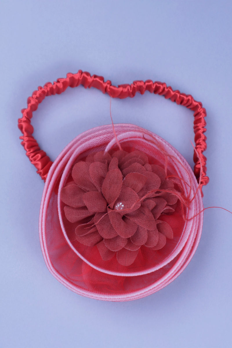 red flower dress with feathers and headband with detachable bow