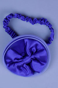 Blue one shoulder high low dress with matching head band and detachable bow
