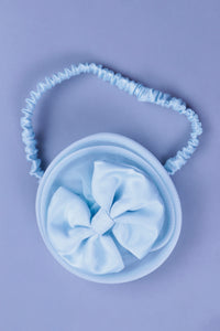 sky blue dress with purles work in chloi and feathers with head band and detachable bow