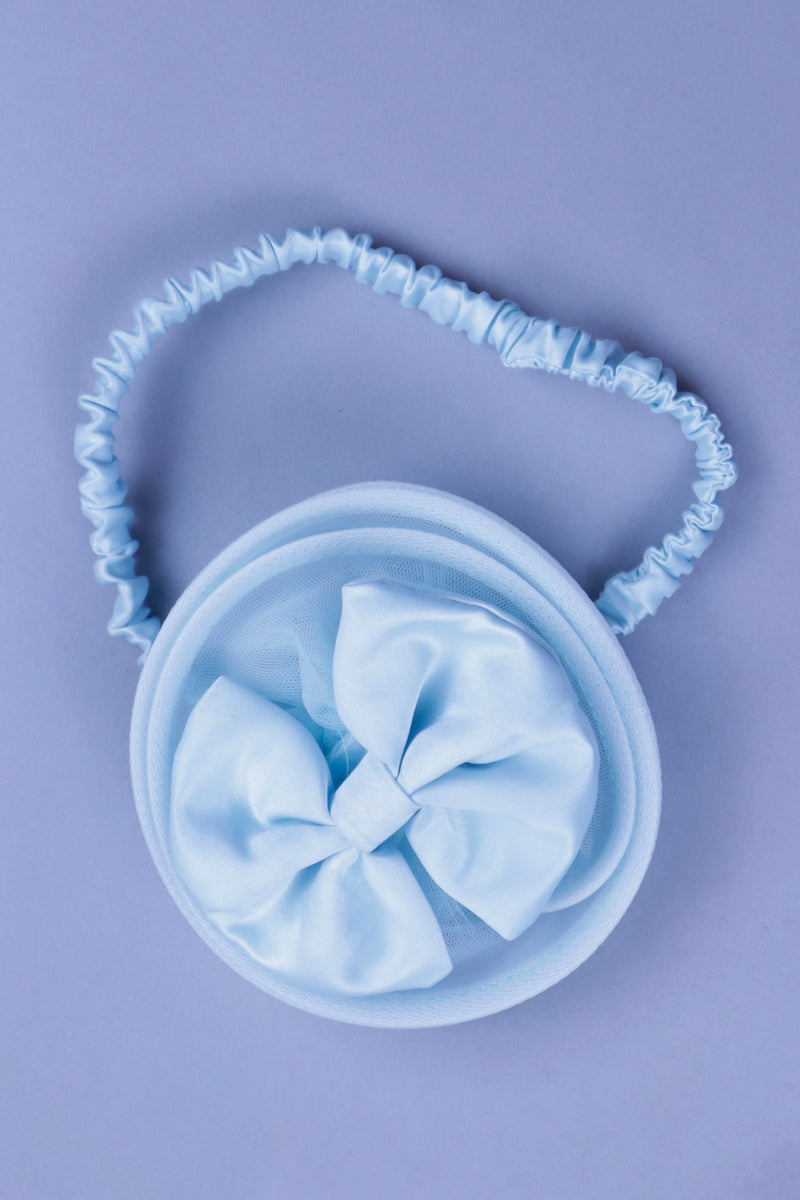 sky blue dress with purles work in chloi and feathers with head band and detachable bow